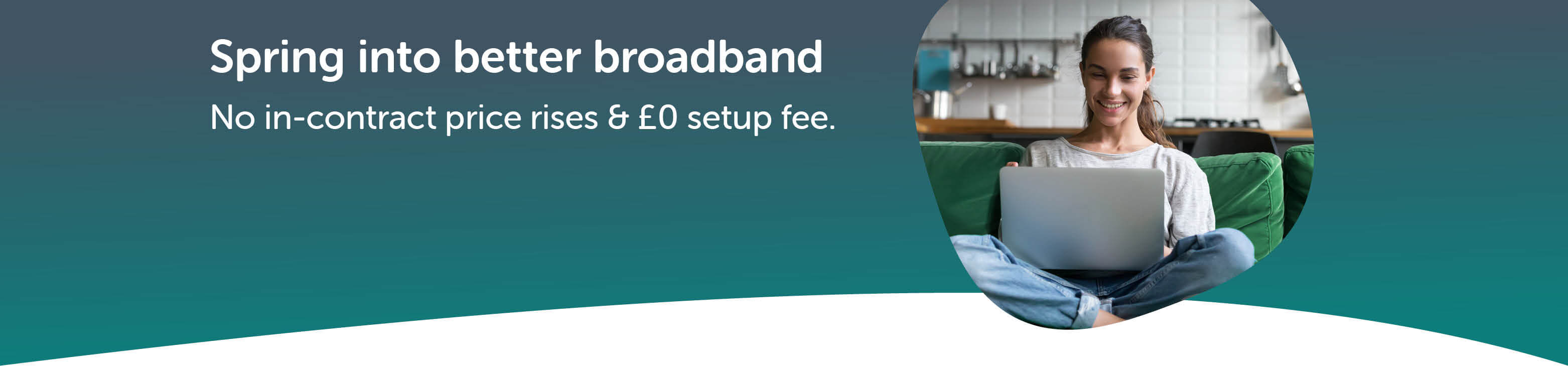 woman sat using her laptop at home