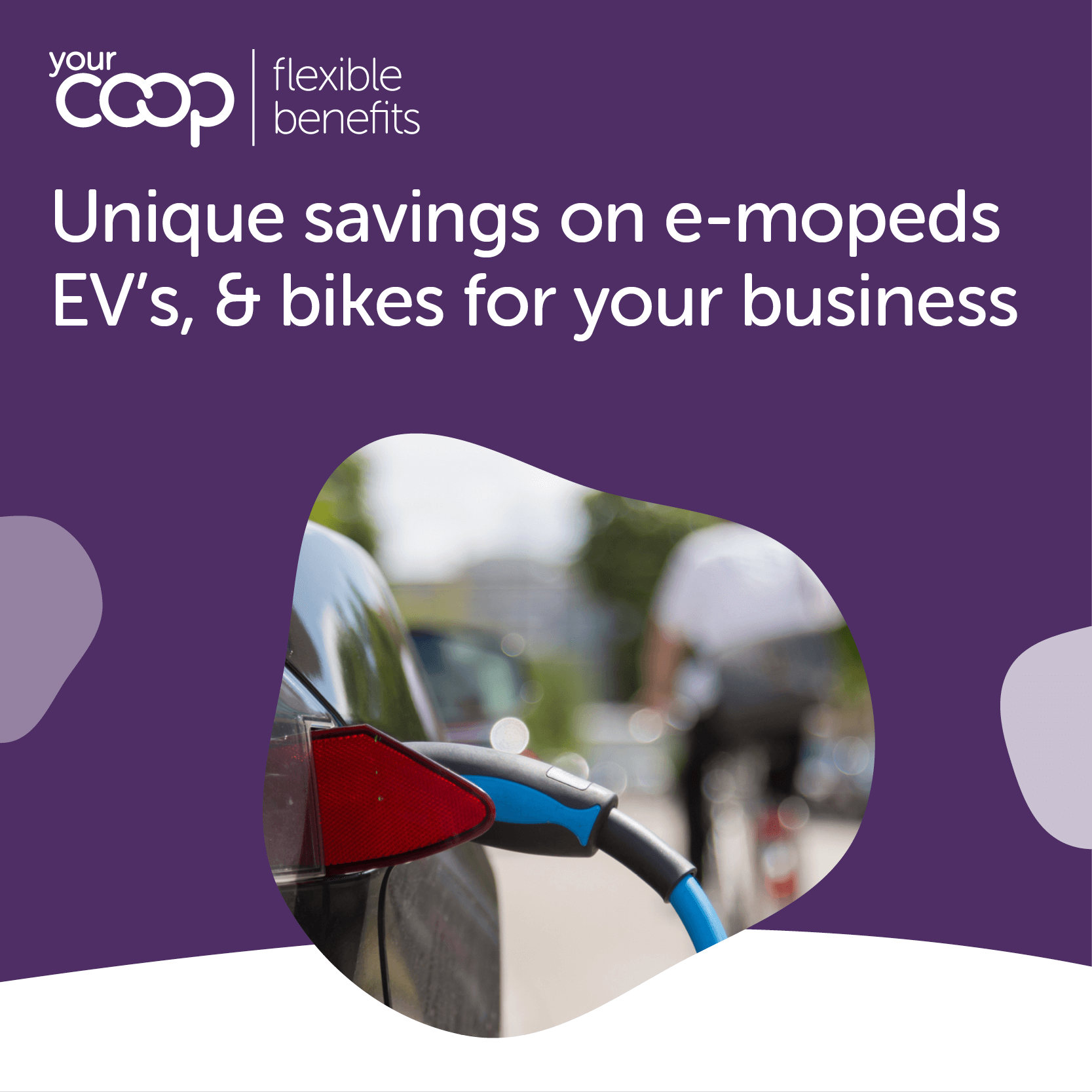 car charging on side of road with bike in the background