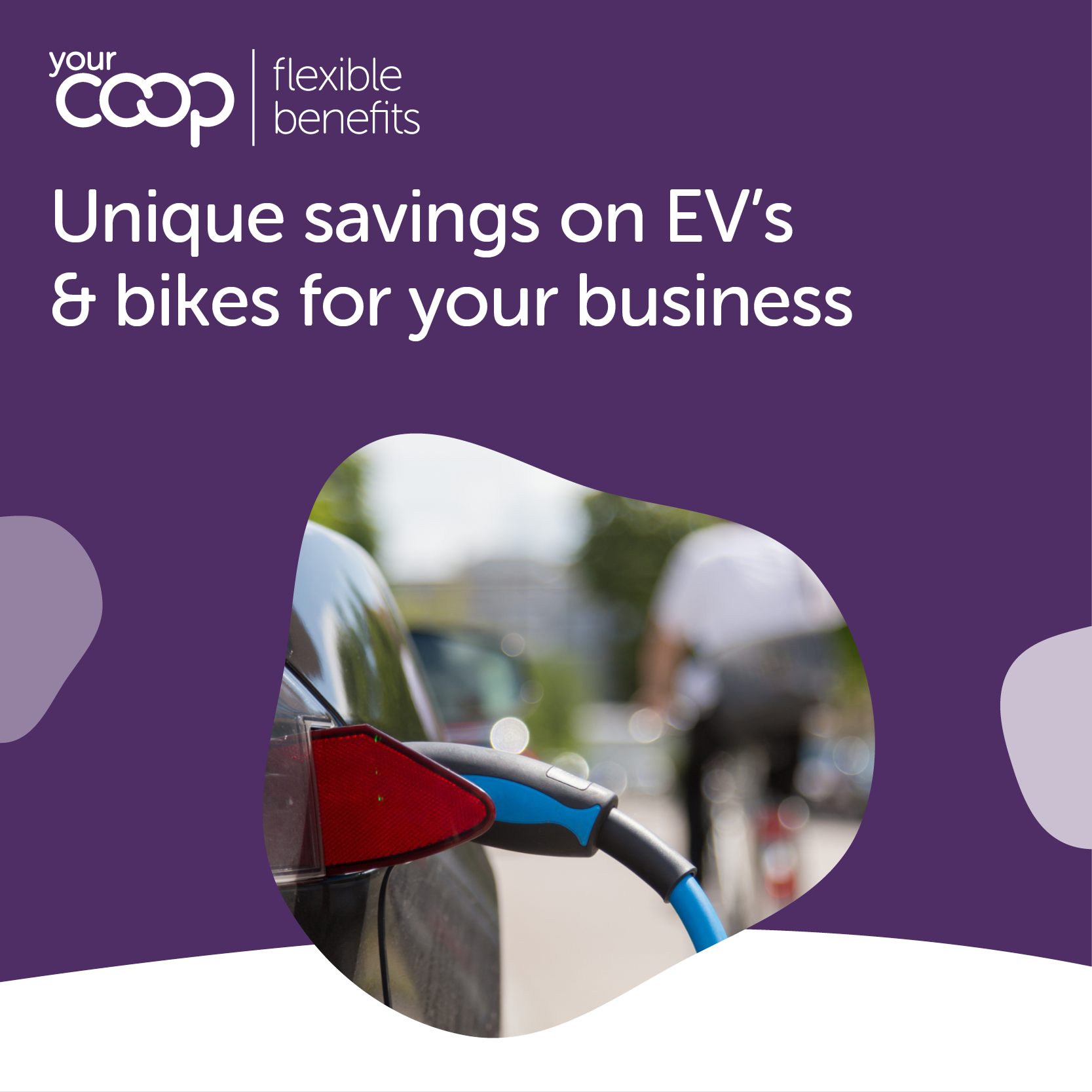 car charging on side of road with bike in the background
