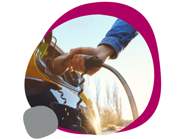 person charging their electric vehicle