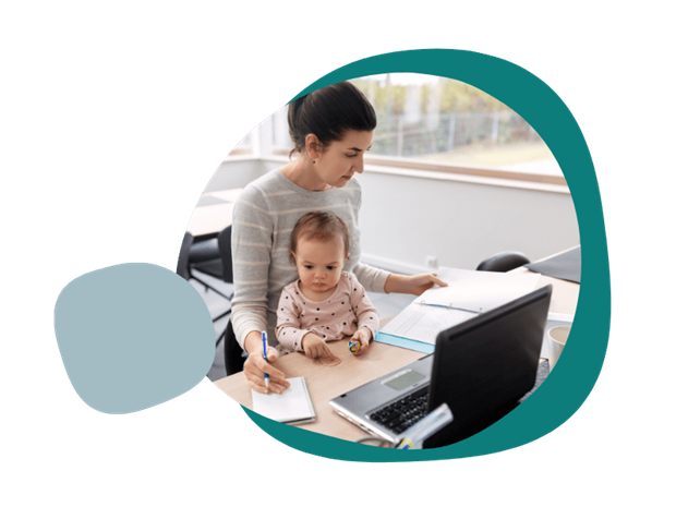 Woman working from home with her child