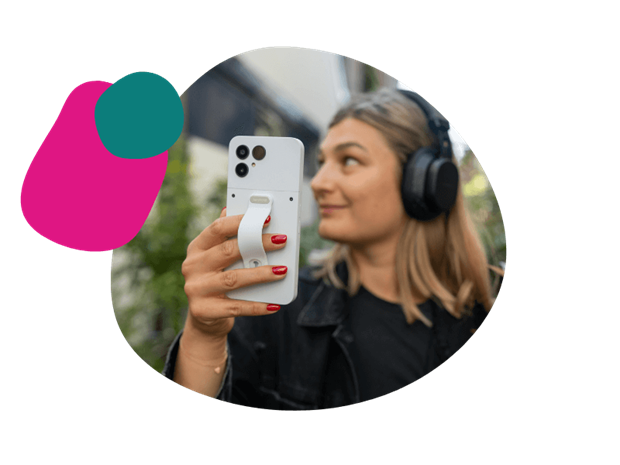 woman holding her Fairphone Gen. 6