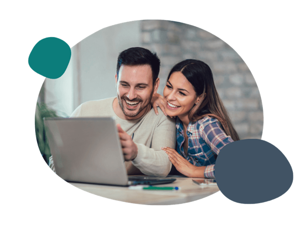 young couple using their laptop computer together