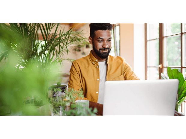 man using his laptop at home