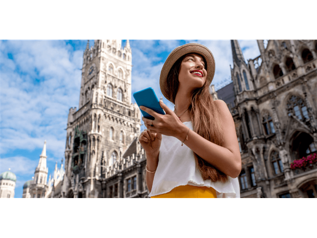 woman using her mobile on holiday