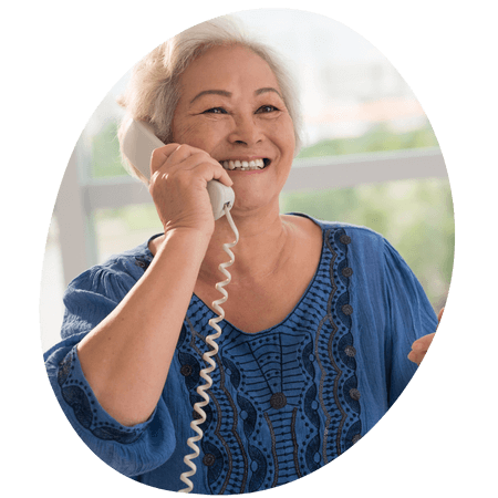 woman using a corded phone