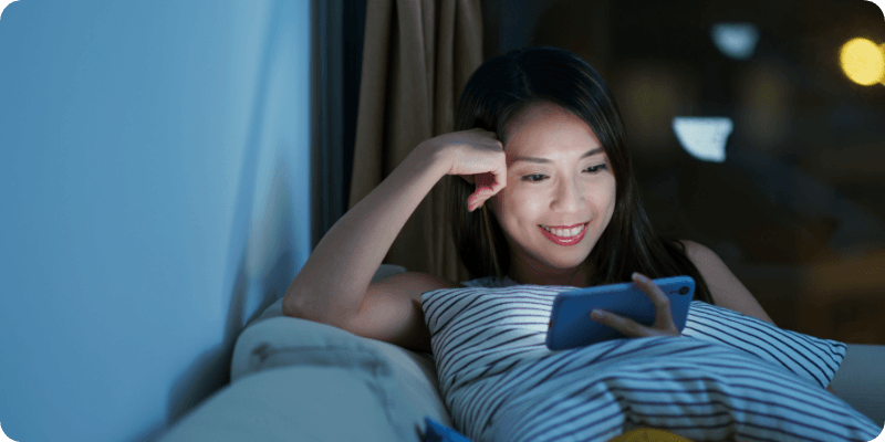 Woman watching a video on her phone