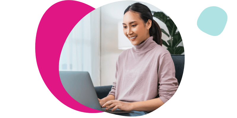young woman using her laptop at home