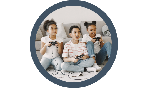 group of children playing video games together