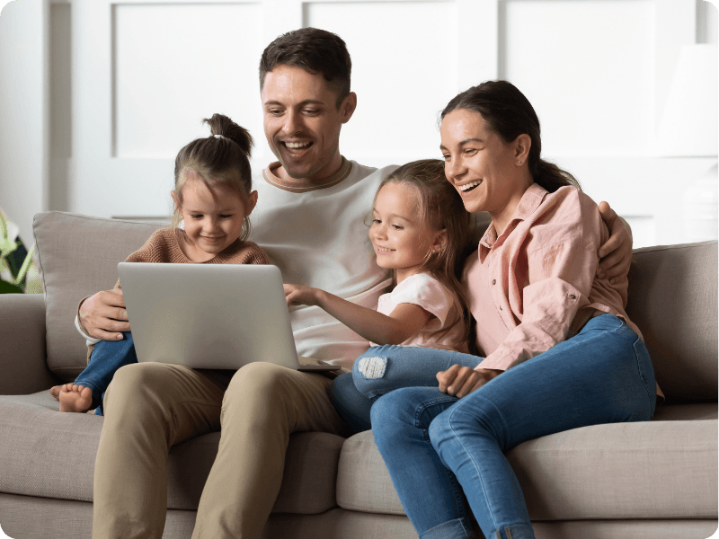 Family using a laptop