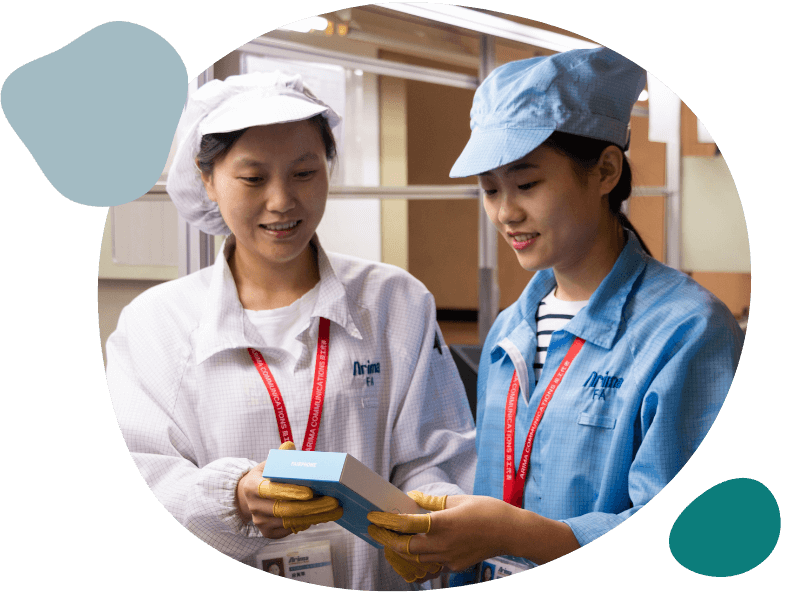 two workers holding a fairphone