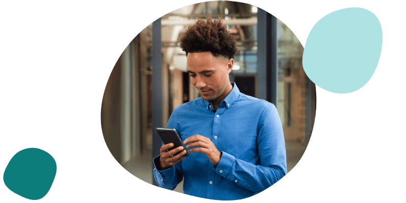 man using his grey fairphone 4