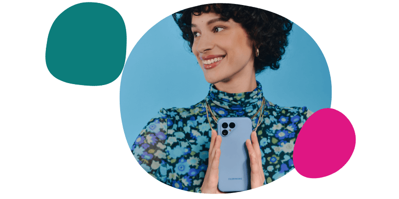 woman holding a Fairphone 5 in blue