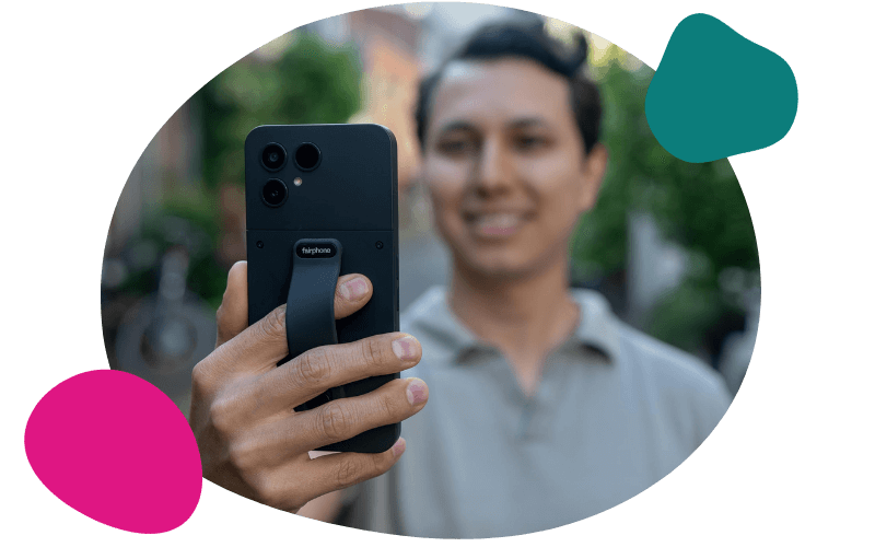 man holding his Fairphone Gen. 6