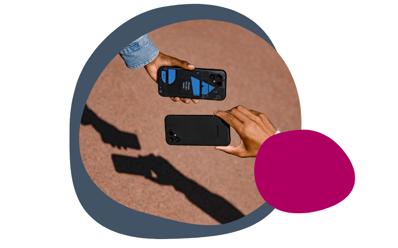 two people holding Fairphone 5s together