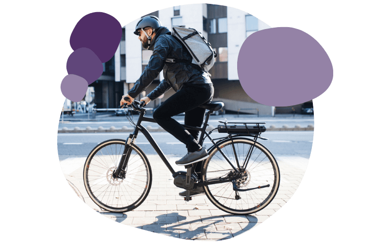 person riding a bike to work