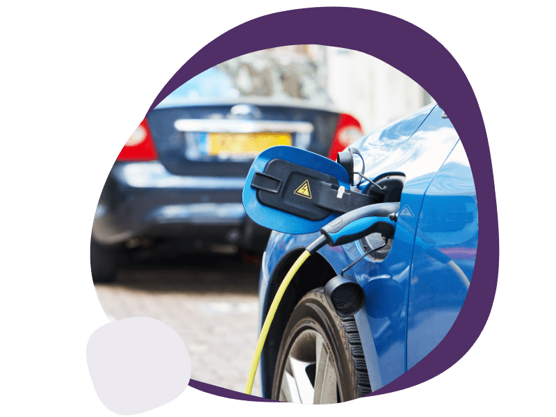 car charging on side of the road