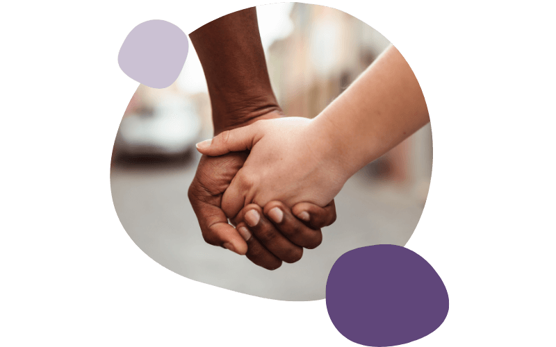 two people holding hands