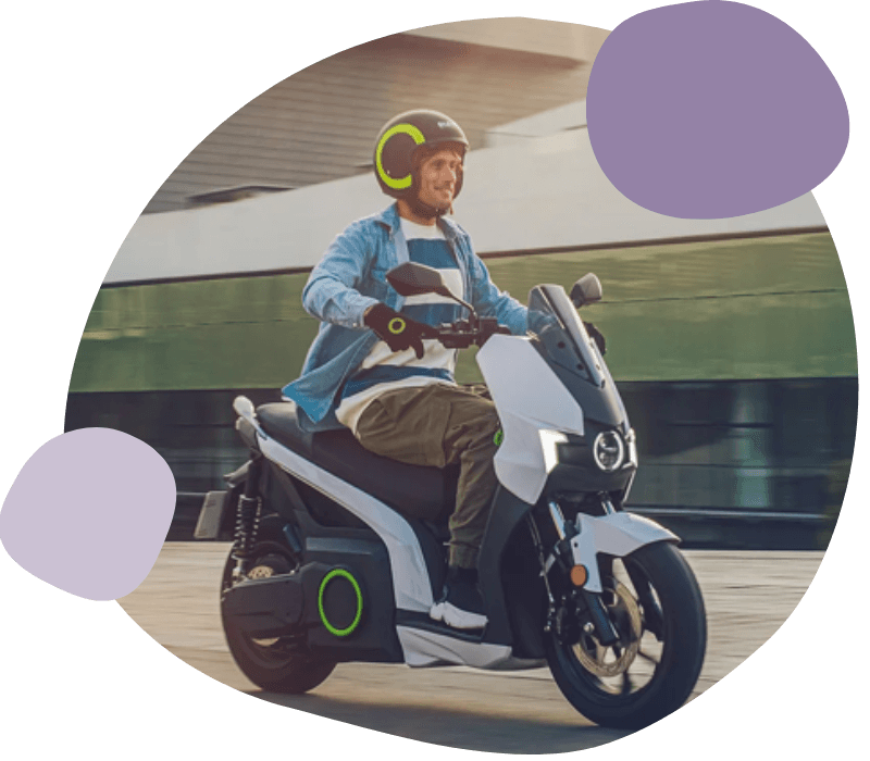 person riding an e-moped