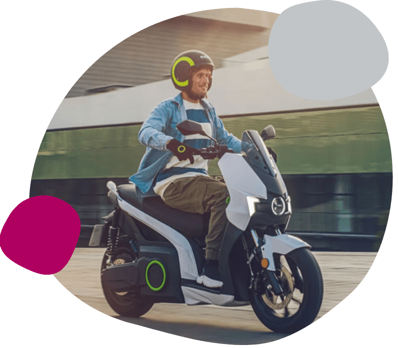 person riding an e-moped