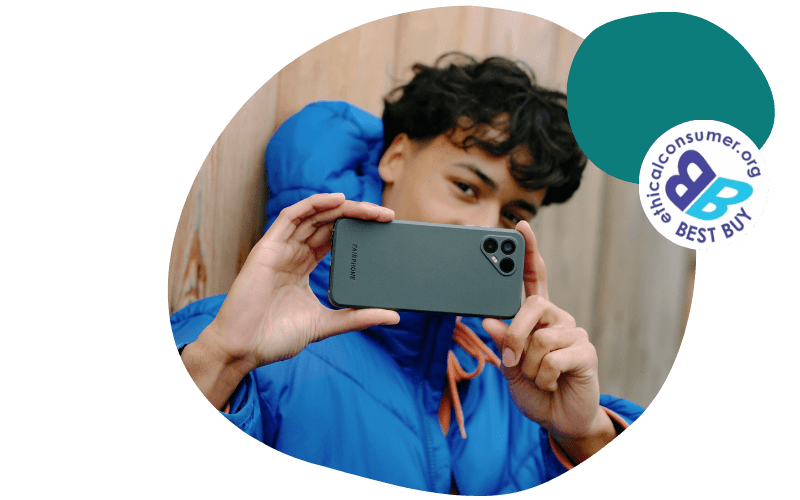 young man using his fairphone to take a picture