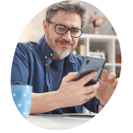 man using his mobile to use the Your Co-op App