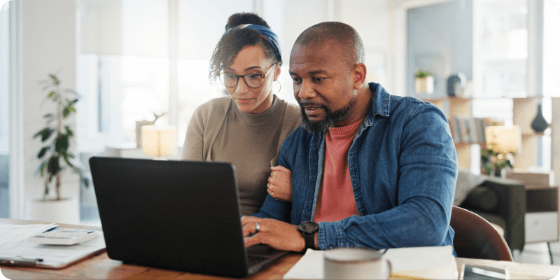couple using their computer learning about the Big Switch Off