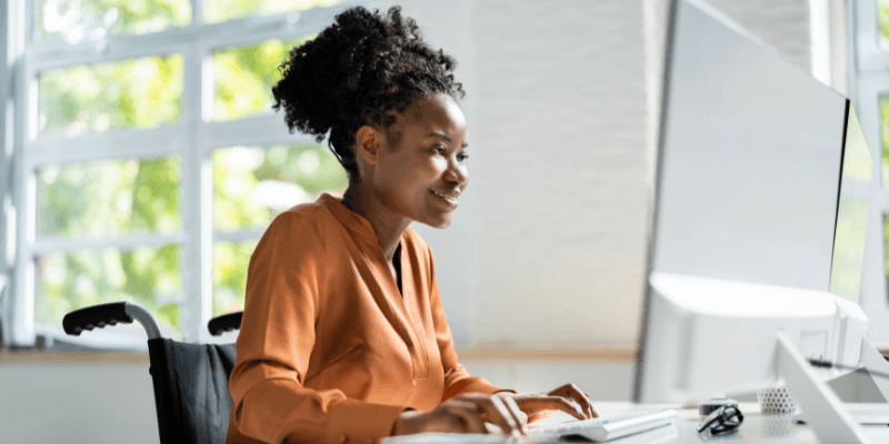 young woman using her laptop at home