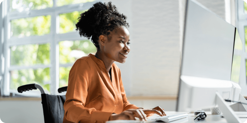 young woman using her laptop at home