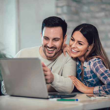 young couple using their laptop 