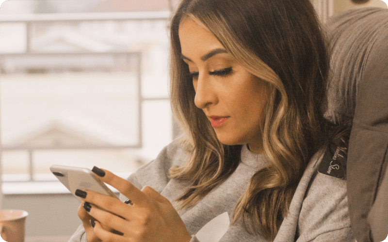 young woman using her mobile