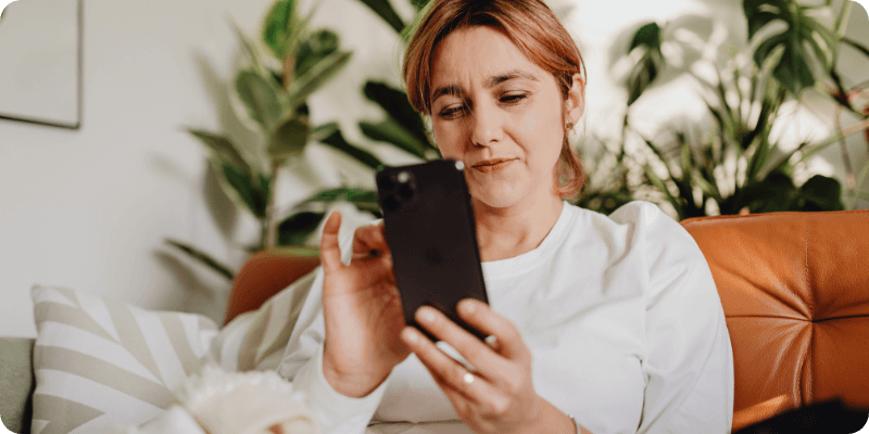 Using social medias on her phone