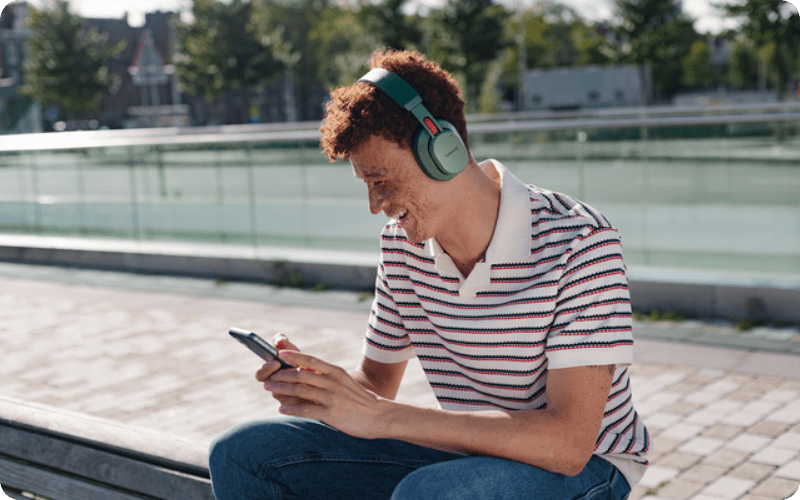 Man using his mobile listening to music