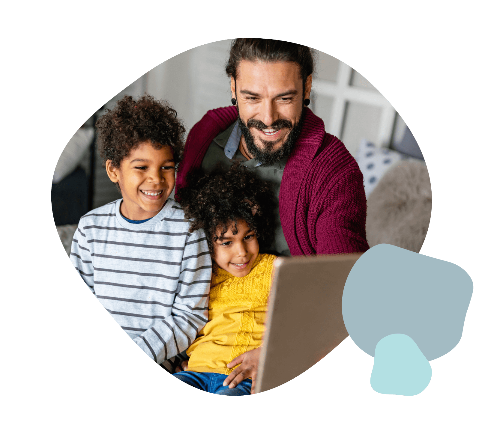 Young family sat down using a laptop