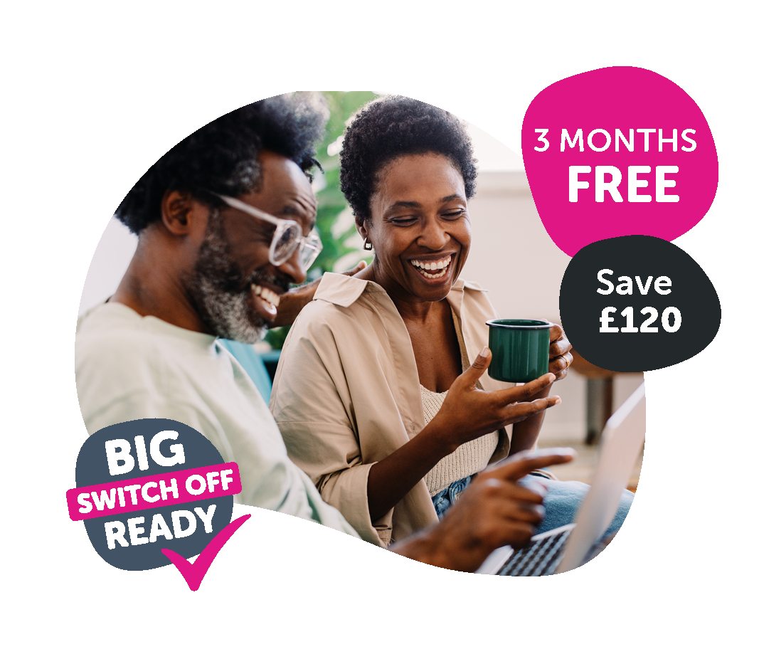 woman with her dog using a computer