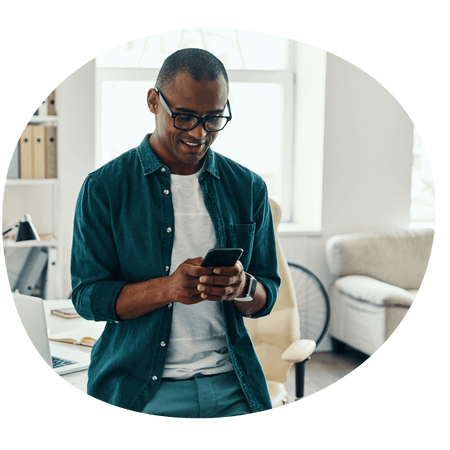 man using his mobile at home