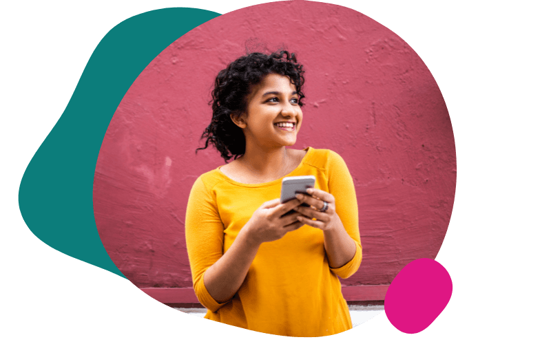 young woman using her mobile outdoors