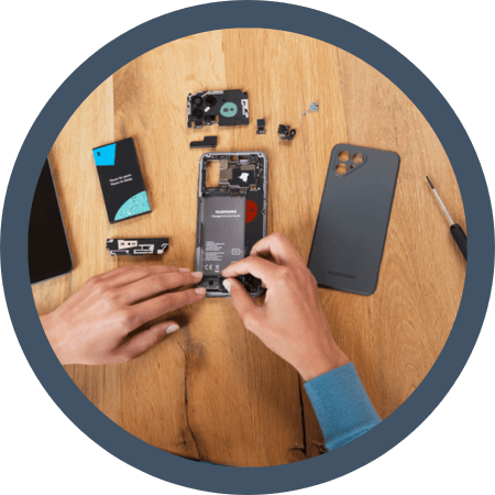 person repairing fairphone 4