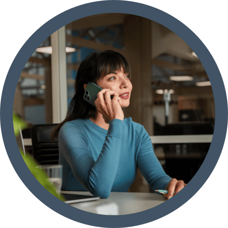 woman using fairphone 4 to make a call