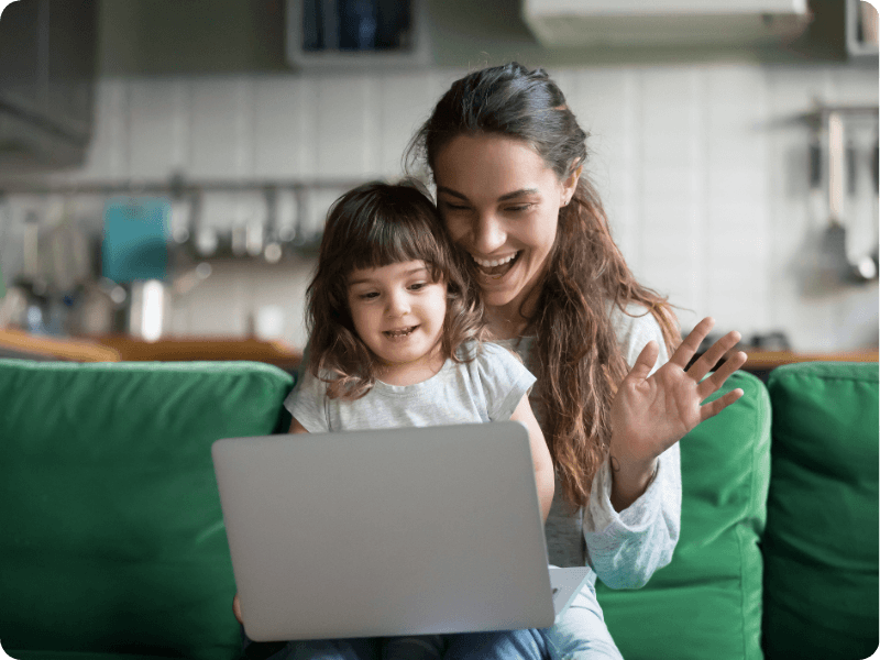 mother and daughter using a laptop
