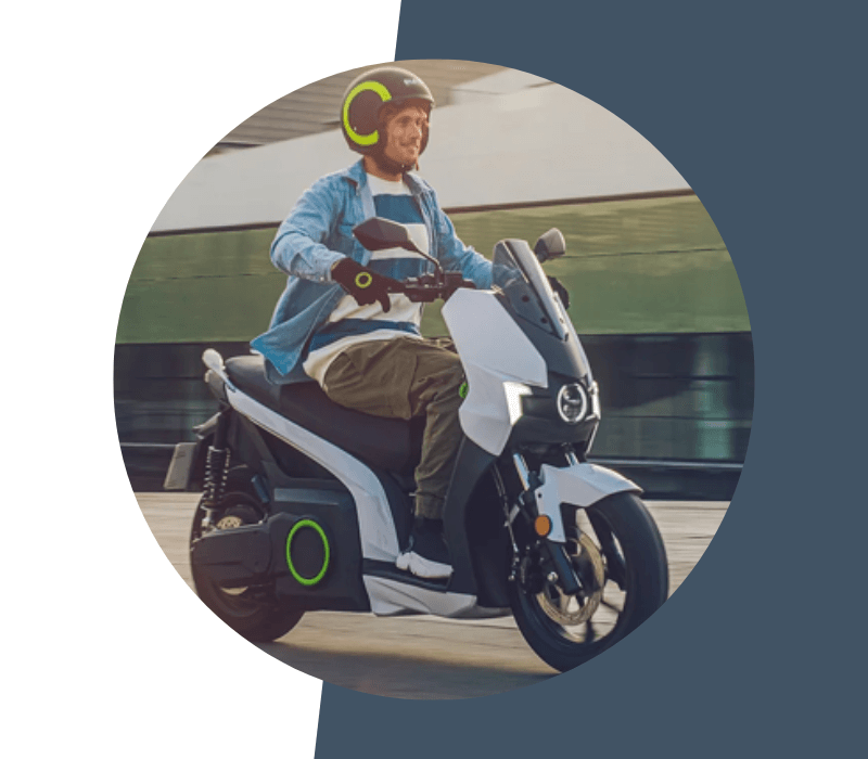 person riding an e-moped