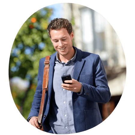 man using his phone on a walk