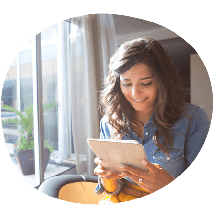woman using a tablet at home