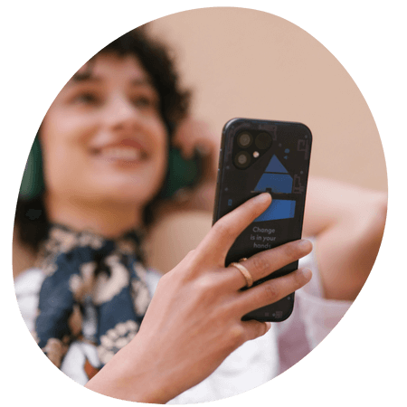 woman using her transparent Fairphone 5