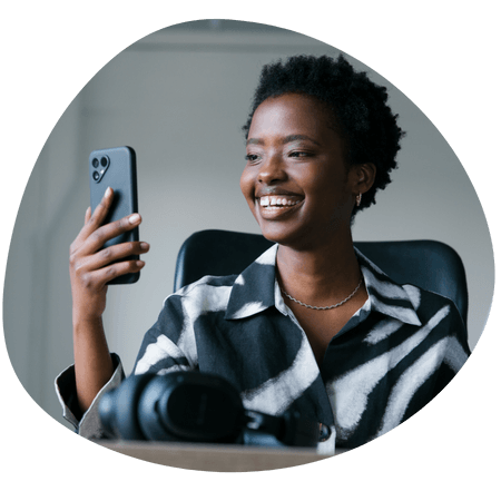 Woman using her Fairphone 5