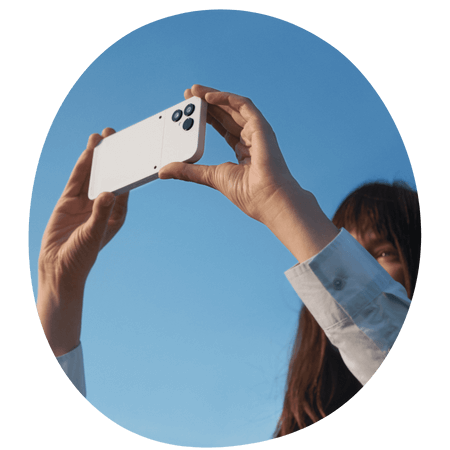 women taking a photo with her Fairphone 6