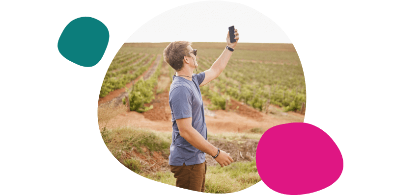 man trying to get signal from his mobile