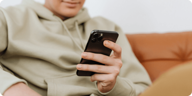 man resetting his phone's network settings
