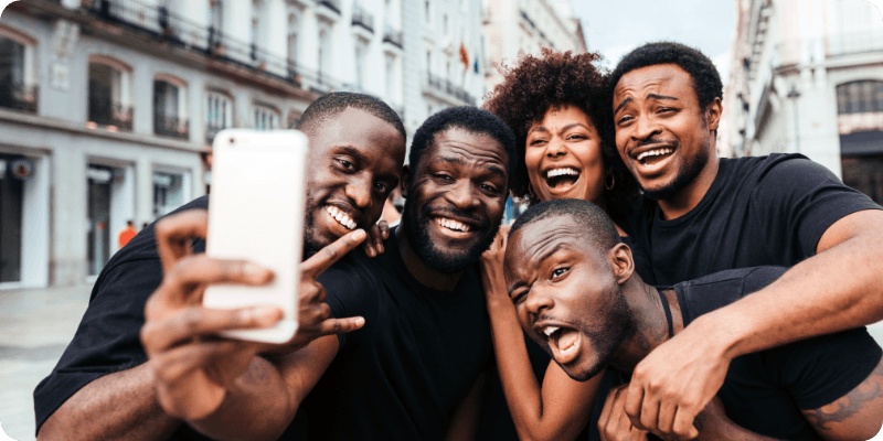 group of friends taking a selfie together