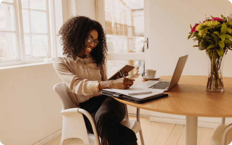 Woman using her laptop searching for broadband